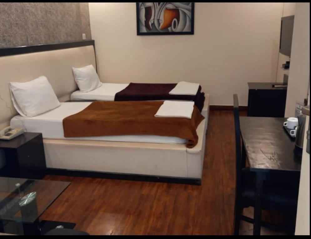 Kartikay Hotel Hisar Ruang foto